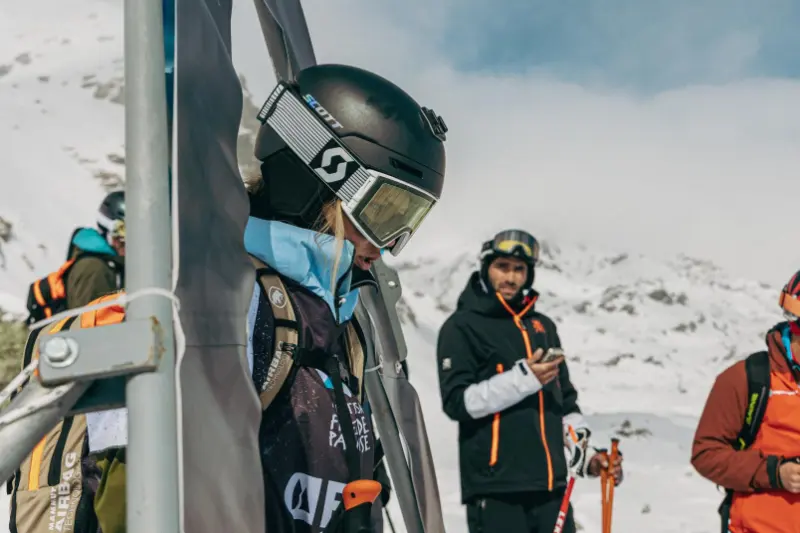 Skiers with helmets and goggles