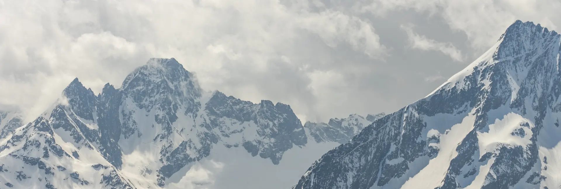 Snowy peaks among the clouds